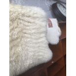 Two sheepskin rugs