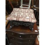 A wrought metal framed foot stool