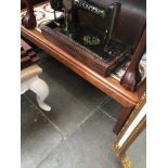 A teak and tile top coffee table