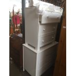 White modern chest of drawers and matching baby changing chest