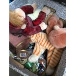 A box of mixed books, soft toys and other toys