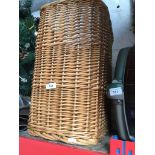 A wicker basket with lid