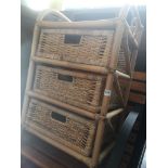 A wicker/cane set of drawers