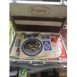 A hard case containing ephemera, football programmes, etc