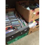 3 boxes of misc DVDs, CDs and cassettes.