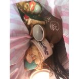 A bag of various ornaments and an alarm clock radio