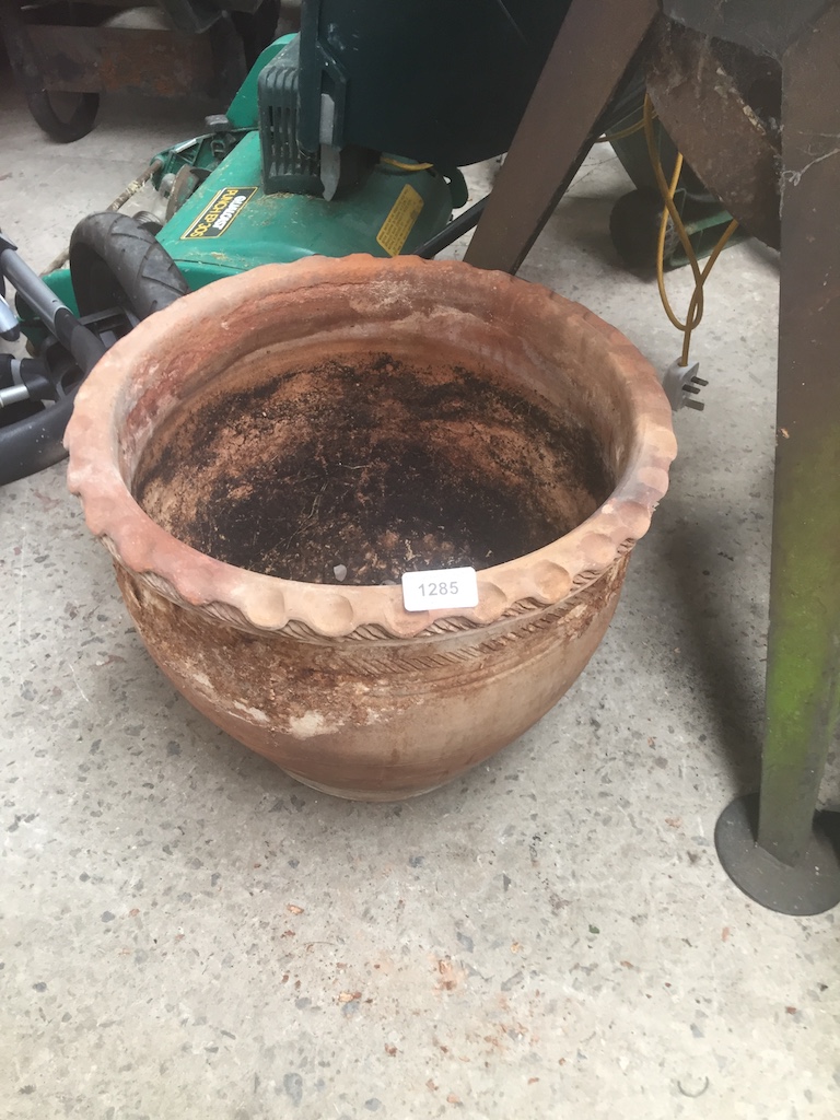 A large terracotta planter