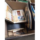 A box containing folders of cigarette cards, matchboxes and other cards, viewmaster and slides, FA