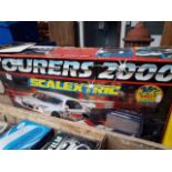 A boxed Scalextric set Catalogue only, live bidding available via our website. If you require P&P