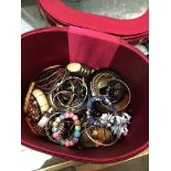 A vanity case of costume bangles Catalogue only, live bidding available via our website. If you