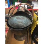 A metal coal scuttle and a brass jam pan. Catalogue only, live bidding available via our website. If
