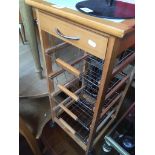 A tile topped wine rack Catalogue only, live bidding available via our website. If you require P&P