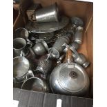 A box of pewter ware Catalogue only, live bidding available via our website. If you require P&P