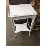 A white painted side / occasional table. Catalogue only, live bidding available via our website.