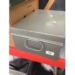 A metal cash box (no key) Catalogue only, live bidding available via our website. If you require P&P