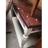 A Victorian side table with painted base Catalogue only, live bidding available via our website.