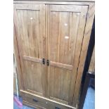 A modern light oak wardrobe Catalogue only, live bidding available via our website. If you require