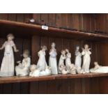 Twelve Nao figures and one small Lladro angel Catalogue only, live bidding available via our