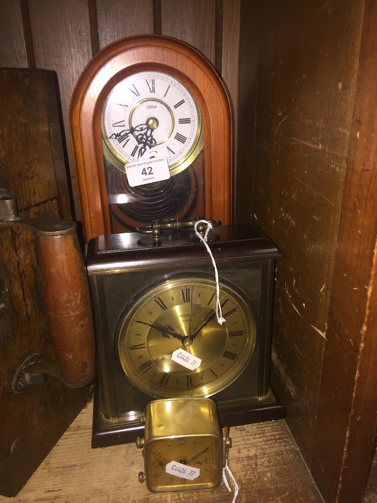 A mantle clock, a Metamec quartz mantle clock and a small French travel clock Catalogue only, live