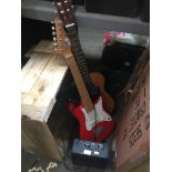 Two childrens guitars inc an electric CBSKY electric guitar with mini amp and a Kapok acoustic