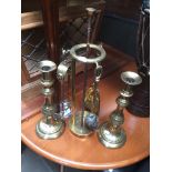 A brass companion set + 2 candlestick holders Catalogue only, live bidding available via our