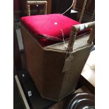 A gold and red ottoman / seat with handles. Catalogue only, live bidding available via our