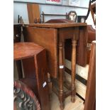 An oak drop leaf table and an occasional table Catalogue only, live bidding available via our