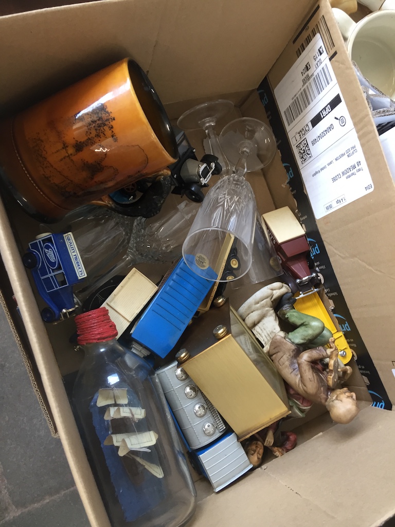 A box of items inc. toy cars. Catalogue only, live bidding available via our website. If you require