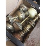 A box of brass parafin lamps. Catalogue only, live bidding available via our website. If you require