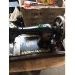 A hand crank Nelson `61 sewing machine in case. Catalogue only, live bidding available via our