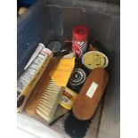 A crate with shoe polish, brushes etc Catalogue only, live bidding available via our website. If you