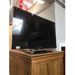 A Panasonic 32" LCD TV with remote Catalogue only, live bidding available via our website. If you