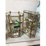 Two trinket displays and contents Catalogue only, live bidding available via our website. If you