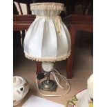 An onyx effect table lamp Catalogue only, live bidding available via our website. If you require P&P