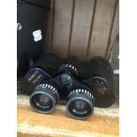 A cased pair of Pathescope 16x50 binoculars Catalogue only, live bidding available via our