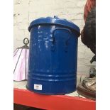 A small blue tin bin with lid Catalogue only, live bidding available via our website. If you require