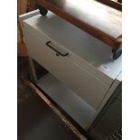 A metal lockable cabinet on castors Catalogue only, live bidding available via our website. If you