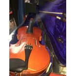 A violin with case and bow. Catalogue only, live bidding available via our website. If you require