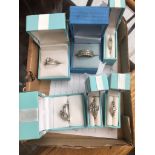 Six boxed silver and Diamonique costume rings Catalogue only, live bidding available via our