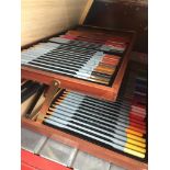 A cased set of colouring pencils Catalogue only, live bidding available via our website. If you