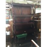 A reproduction mahogany waterfall bookcase with pierced and finial decoration Catalogue only, live
