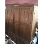 A pine triple wardrobe Catalogue only, live bidding available via our website. If you require P&P