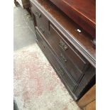 A mahogany chest of drawers with aesthetic handles Catalogue only, live bidding available via our