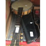 Two banjos, one in case - as found Catalogue only, live bidding available via our website. If you