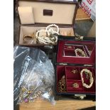 Two jewellery boxes and a bag of costume jewellery Catalogue only, live bidding available via our
