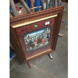 A fire screen with eastern scene material picture Catalogue only, live bidding available via our