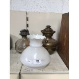 Two brass oil lamps, onw wirg shade Catalogue only, live bidding available via our website. If you
