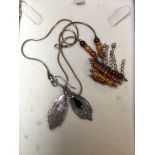 Silver earings and a necklace Catalogue only, live bidding available via our website. If you require