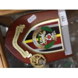 The York & Lancaster regiment plaque and a cap badge Catalogue only, live bidding available via