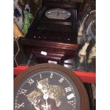 An Acctim wall clock and a circular clock. Catalogue only, live bidding available via our website.